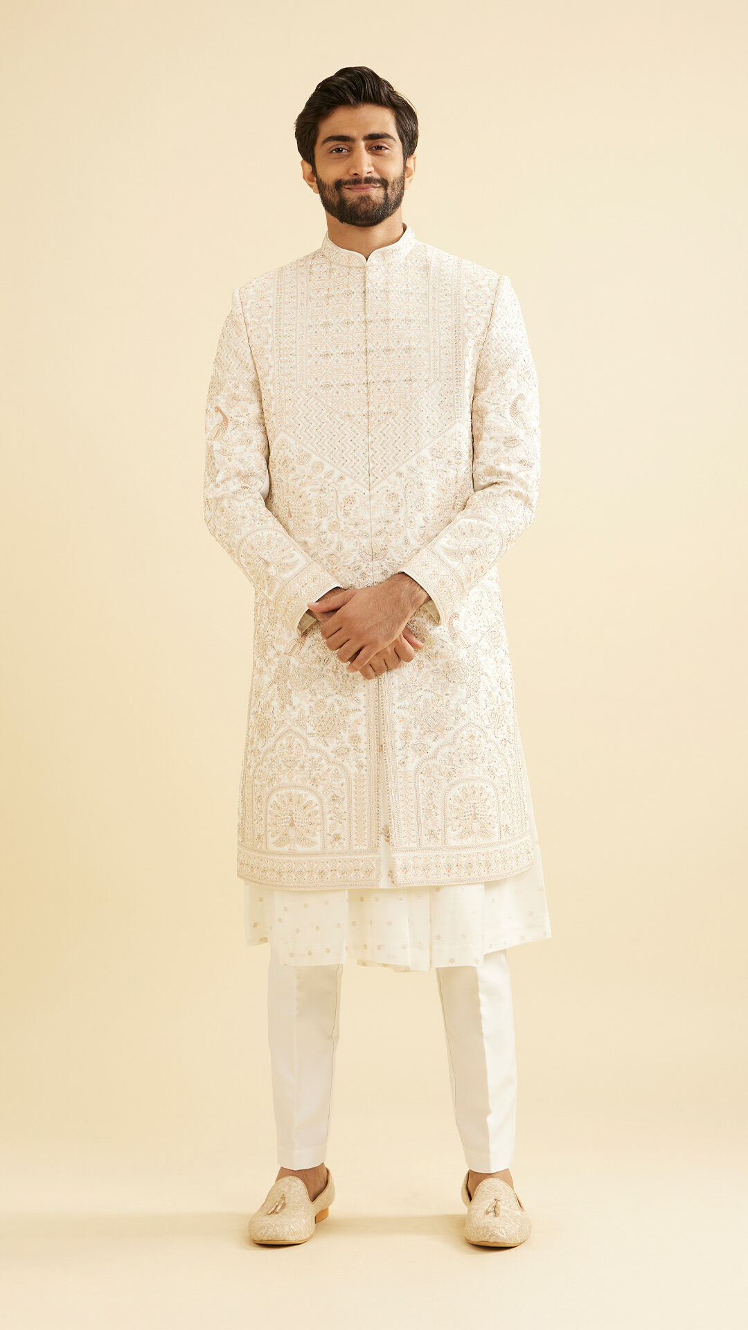 Groom wearing white designer sherwani for wedding